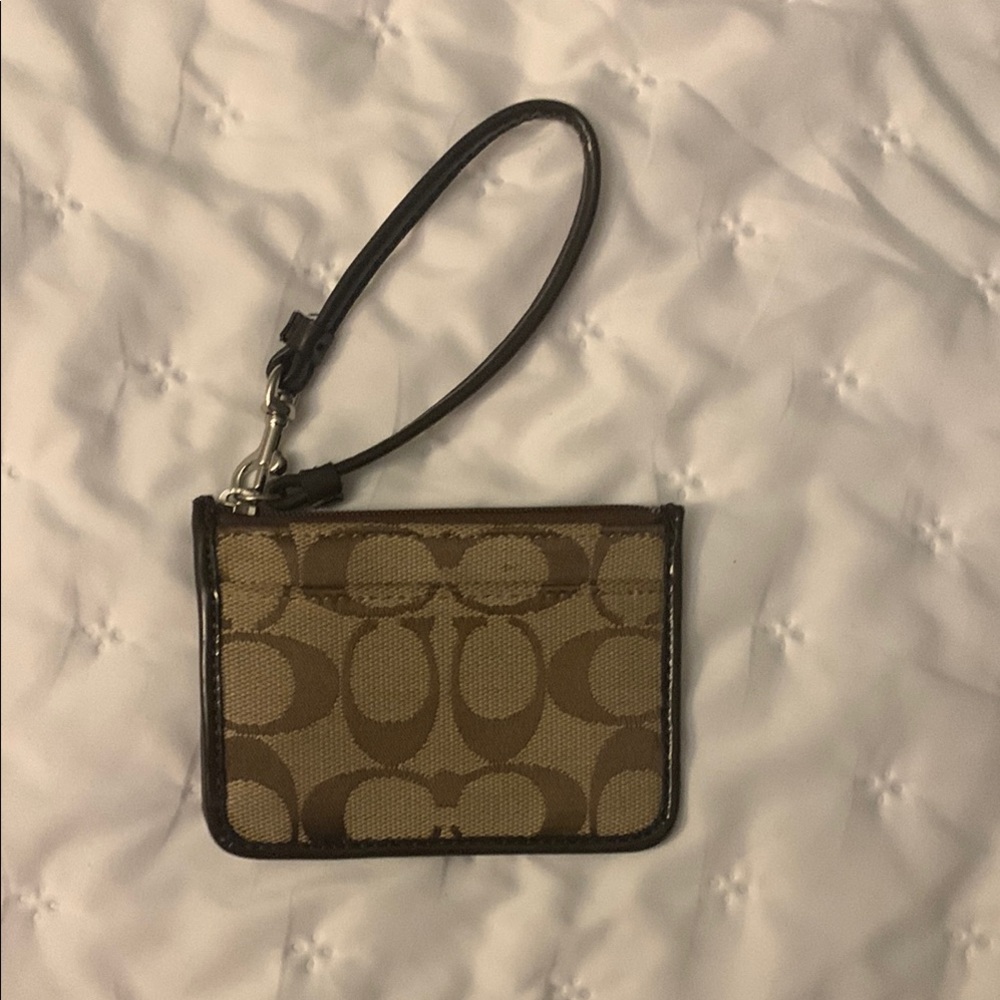 Brown Coach wallet wristlet